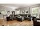 Spacious living room with recessed lighting and a large sectional sofa at 654 E 79Th St, Indianapolis, IN 46240