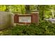 Community entrance sign featuring the name 'Williams Creek' with brick columns and greenery at 654 E 79Th St, Indianapolis, IN 46240