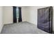 Bedroom with carpet, featuring a storage closet and a window at 7323 Elm Ridge Dr, Indianapolis, IN 46236