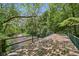 Wooden bridge over a serene creek, offering a peaceful retreat at 7323 Elm Ridge Dr, Indianapolis, IN 46236