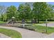 This shot showcases the neighborhood playground, providing children with fun outdoor activities at 7323 Elm Ridge Dr, Indianapolis, IN 46236