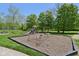 The community playground offers swings, slides, and a fun area for children to gather and play at 7323 Elm Ridge Dr, Indianapolis, IN 46236
