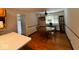 Cozy dining area featuring hardwood floors, a classic table setting, and natural light, ideal for Gathering meals at 7334 E 14Th St, Indianapolis, IN 46219