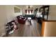 Inviting living room with plush seating, warm lighting, and a spacious layout perfect for relaxation and entertainment at 7334 E 14Th St, Indianapolis, IN 46219