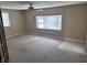 Bedroom with large windows to provide natural light at 7450 Cobblestone W Dr, Indianapolis, IN 46236