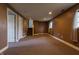Basement area showcasing the stairs and windows, highlighting the potential living space and natural light at 8232 N Chaucer Ct, Columbus, IN 47201