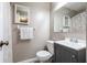 Bathroom with single sink vanity, framed mirror, and shower with curtain at 8232 N Chaucer Ct, Columbus, IN 47201