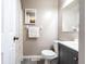 Bathroom with single sink vanity, framed mirror, and shower with curtain at 8232 N Chaucer Ct, Columbus, IN 47201