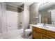 Clean bathroom featuring a bathtub and shower, a toilet, and a vanity with a sink at 8911 Hunters Creek Dr # 311, Indianapolis, IN 46227