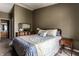 Comfortable main bedroom featuring neutral walls, carpeted flooring, and natural light at 8911 Hunters Creek Dr # 311, Indianapolis, IN 46227