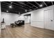 Spacious finished basement with recessed lighting, neutral paint, and durable flooring, perfect for entertaining at 8966 Wooster Ct, Fishers, IN 46038
