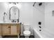Bathroom featuring a shower and tub combination, stylish vanity, and modern fixtures at 8966 Wooster Ct, Fishers, IN 46038