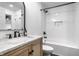 Bathroom featuring a shower and tub combination, stylish vanity, and modern fixtures at 8966 Wooster Ct, Fishers, IN 46038