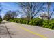 Scenic paved trail winding through a wooded neighborhood, perfect for walking and biking at 8966 Wooster Ct, Fishers, IN 46038
