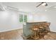 A bar with seating featuring wooden bar stools and a convenient countertop at 90 S Morgantown Rd, Greenwood, IN 46142