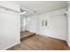 Spacious basement featuring waterproofed walls, tiled floors, and a walkout to the exterior at 90 S Morgantown Rd, Greenwood, IN 46142