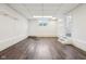 Spacious basement featuring waterproofed walls, tiled floors, and a walkout to the exterior at 90 S Morgantown Rd, Greenwood, IN 46142