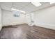 Spacious basement featuring waterproofed walls, tiled floors, and a walkout to the exterior at 90 S Morgantown Rd, Greenwood, IN 46142
