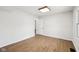 This is an empty bedroom with hard wood floors and white walls, ready to make your own at 90 S Morgantown Rd, Greenwood, IN 46142