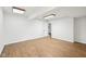 Expansive room features light hardwood floors and an open layout, ready to be filled with possibilities at 90 S Morgantown Rd, Greenwood, IN 46142