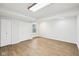 Lots of space and natural light in this room featuring new flooring, closet space, and a large window at 90 S Morgantown Rd, Greenwood, IN 46142