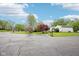 Long driveway leading to a well-maintained home surrounded by mature trees and greenery at 90 S Morgantown Rd, Greenwood, IN 46142