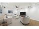 Cozy living room with a comfortable sectional, contemporary decor, and ample seating at 90 S Morgantown Rd, Greenwood, IN 46142