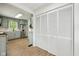 A spacious room that leads into an updated kitchen, and also offers a closet for storage at 90 S Morgantown Rd, Greenwood, IN 46142