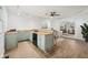 Stylish wet bar area with a sink, cabinets, and modern lighting fixtures at 90 S Morgantown Rd, Greenwood, IN 46142