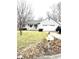 Charming one-story home featuring an attached two-car garage and well-maintained front lawn at 952 Delray Dr, Indianapolis, IN 46241
