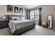This bedroom features a large window and plush carpet, creating a cozy and inviting atmosphere at 9575 Thradd St, Fishers, IN 46038
