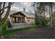 Backyard view of the house with a screened in porch and deck at 9626 Oakhaven Ct, Indianapolis, IN 46256