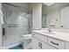 Modern bathroom features a glass-enclosed shower, white vanity, and sleek fixtures at 9626 Oakhaven Ct, Indianapolis, IN 46256