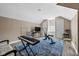 Versatile bonus room with exercise equipment, piano, and ample space at 9626 Oakhaven Ct, Indianapolis, IN 46256