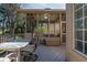 Inviting deck with outdoor seating and views of the screened in porch at 9626 Oakhaven Ct, Indianapolis, IN 46256