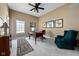 Spacious home office with a desk, chair, and a large window for natural light at 9626 Oakhaven Ct, Indianapolis, IN 46256