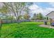 Spacious, fenced backyard provides ample room for outdoor activities at 990 Bull Run W Dr, Greenwood, IN 46143