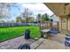 A fenced backyard featuring patio, grill, and lawn, great for outdoor activities at 990 Bull Run W Dr, Greenwood, IN 46143