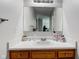 Bathroom showing a vanity with a mirror and a white countertop at 990 Bull Run W Dr, Greenwood, IN 46143