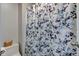 Bathroom featuring a shower with a blue-and-white floral shower curtain at 990 Bull Run W Dr, Greenwood, IN 46143