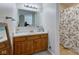 Bathroom featuring a vanity with a mirror and a shower with a curtain at 990 Bull Run W Dr, Greenwood, IN 46143