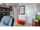 Bedroom featuring neutral walls, white trim, and ample closet space at 990 Bull Run W Dr, Greenwood, IN 46143