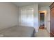 Comfortable bedroom offering closet space, a window, and neutral carpeting at 990 Bull Run W Dr, Greenwood, IN 46143