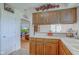 Open kitchen layout with stainless steel appliances and connection to living area at 990 Bull Run W Dr, Greenwood, IN 46143