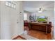 Bright living room showcasing hardwood floors, neutral paint, and ample seating at 990 Bull Run W Dr, Greenwood, IN 46143