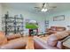Comfortable living room with stylish decor, hardwood floors, and a ceiling fan at 990 Bull Run W Dr, Greenwood, IN 46143