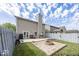 Spacious backyard with a patio, fire pit, grill, and well-maintained lawn, perfect for outdoor entertaining and relaxation at 10208 Clear Sky Dr, Avon, IN 46123