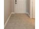 Clean entryway featuring neutral tile flooring, providing a welcoming transition into the home's interior at 10208 Clear Sky Dr, Avon, IN 46123