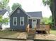 Charming single-Gathering home featuring a welcoming front porch and a well-maintained yard at 1041 Hervey St, Indianapolis, IN 46203