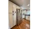 Modern kitchen featuring stainless steel appliances, white cabinets, and a subway tile backsplash at 1041 Hervey St, Indianapolis, IN 46203